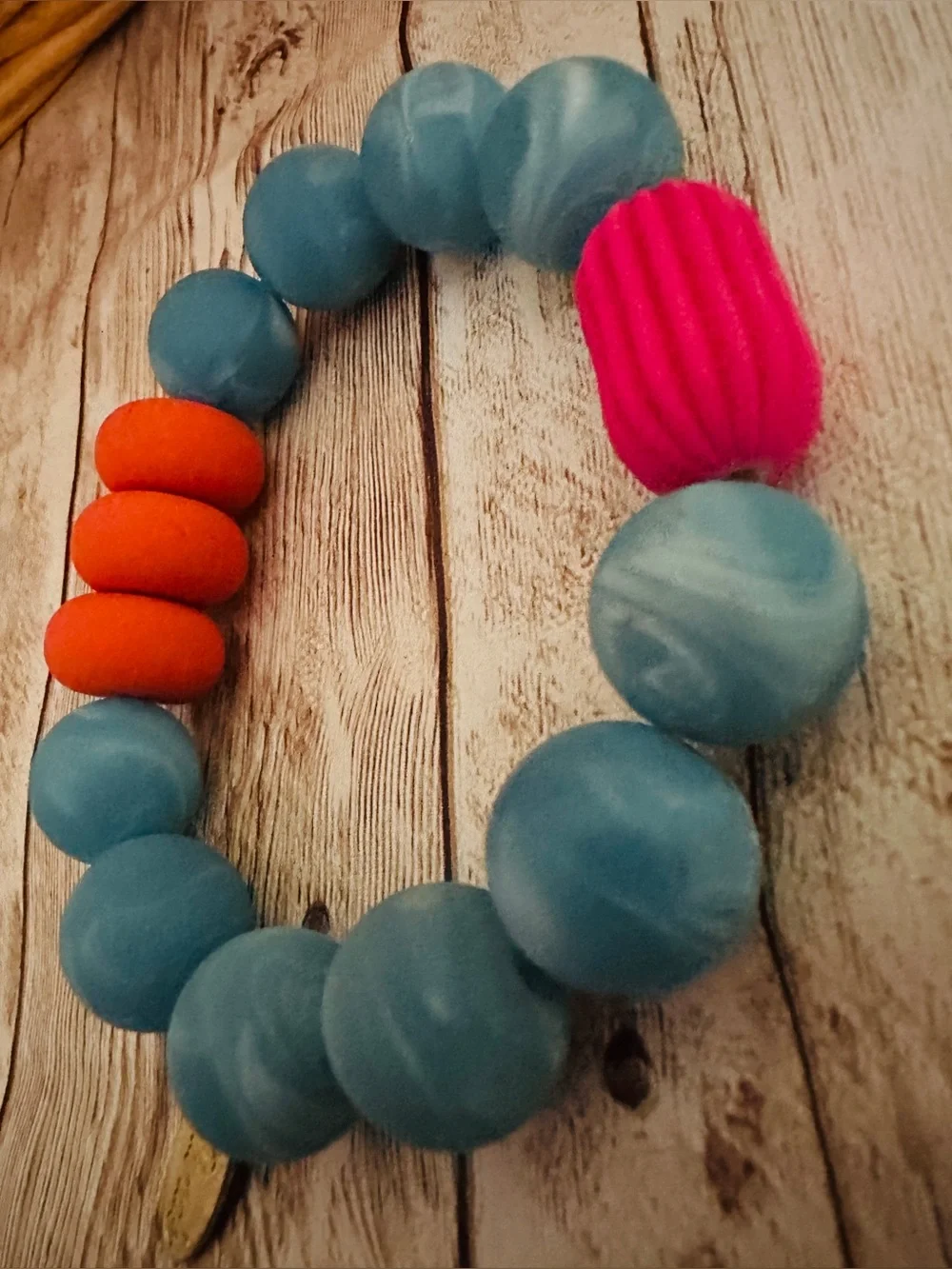 Blue Bead Stretch Bracelet with Orange & Pink Accents - Plunder-Branded Charm